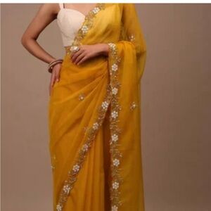 Elegant Yellow Saree with Floral Embroidery